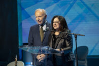 Anita Zucker and Senator Joseph Lieberman presenting at 84MVX MALL - Purchase Q Honey Badger 